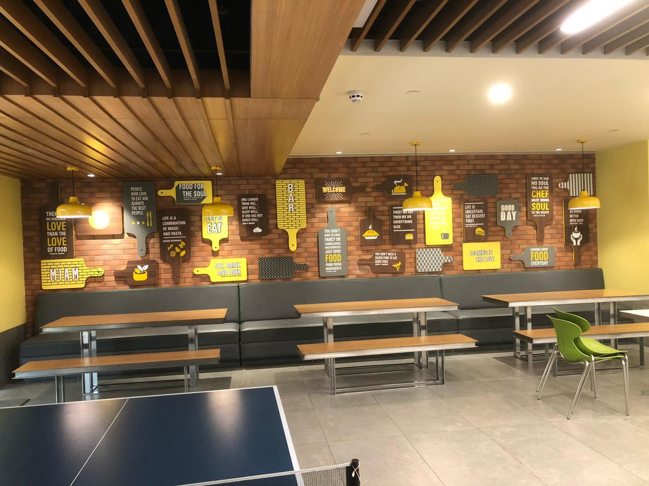 Creative Office Cafeteria with Brick Wall